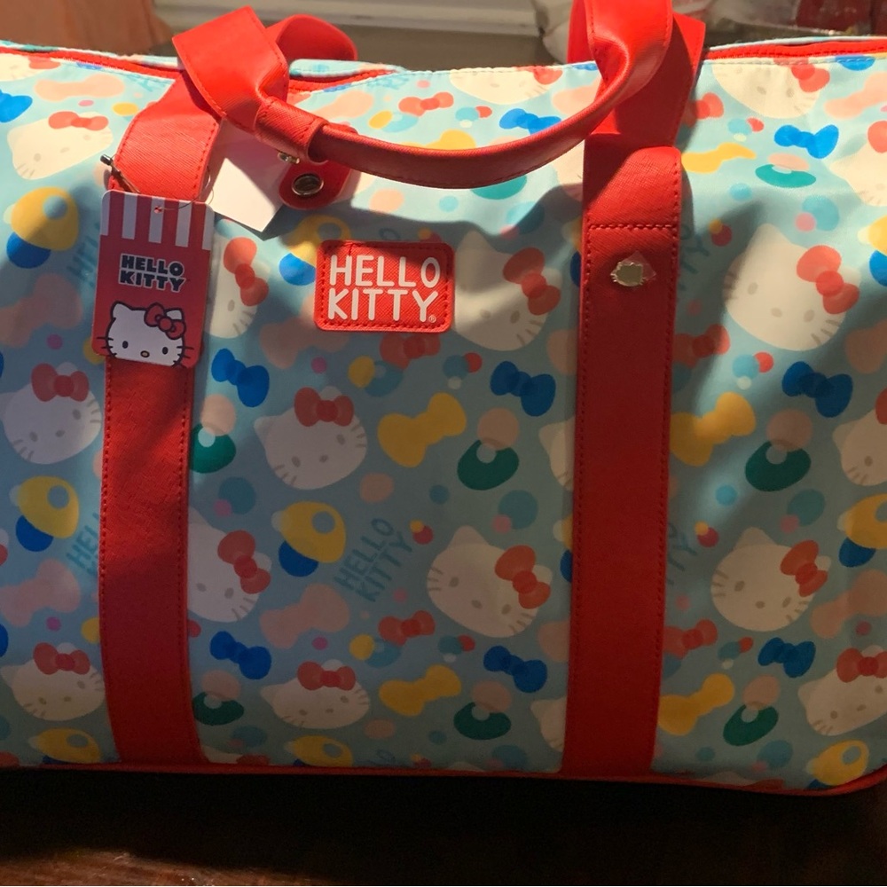 Hello kitty rolling duffle bag